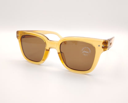 gafas de sol izipizi para niños y adolescentes en color amarillo con lentes marrones