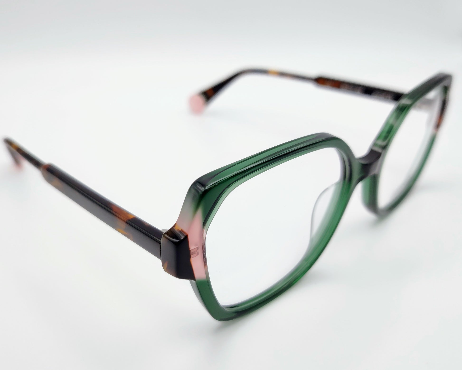 gafas le parc porset 03, montura de acetato en tonos verde y rosa, diseño cuadrado con bordes suaves, estilo elegante y contemporáneo