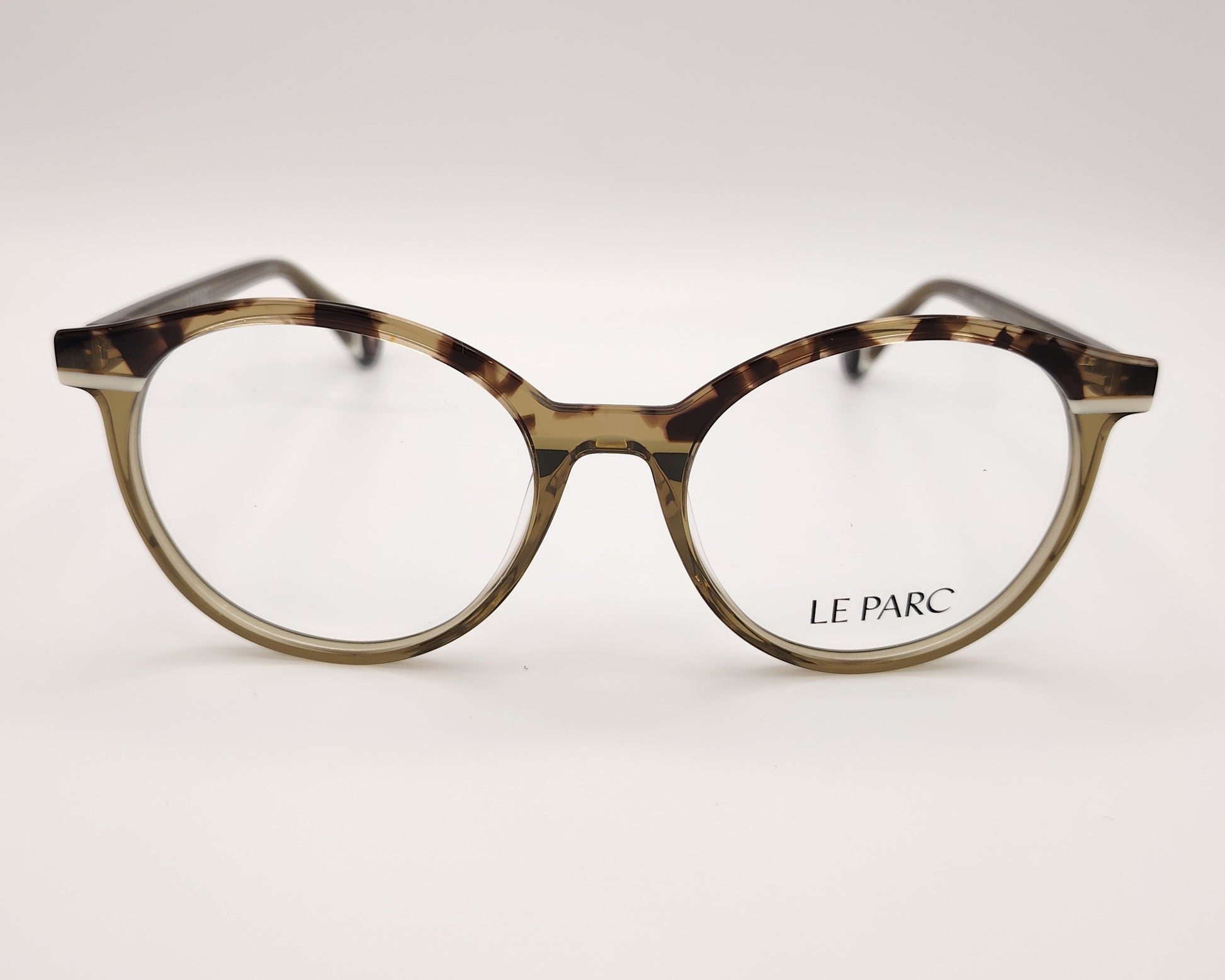 gafas le parc ribbon 04, montura redonda de acetato en tonos habana y verde translúcido, diseño ligero y elegante, estilo clásico con un toque moderno