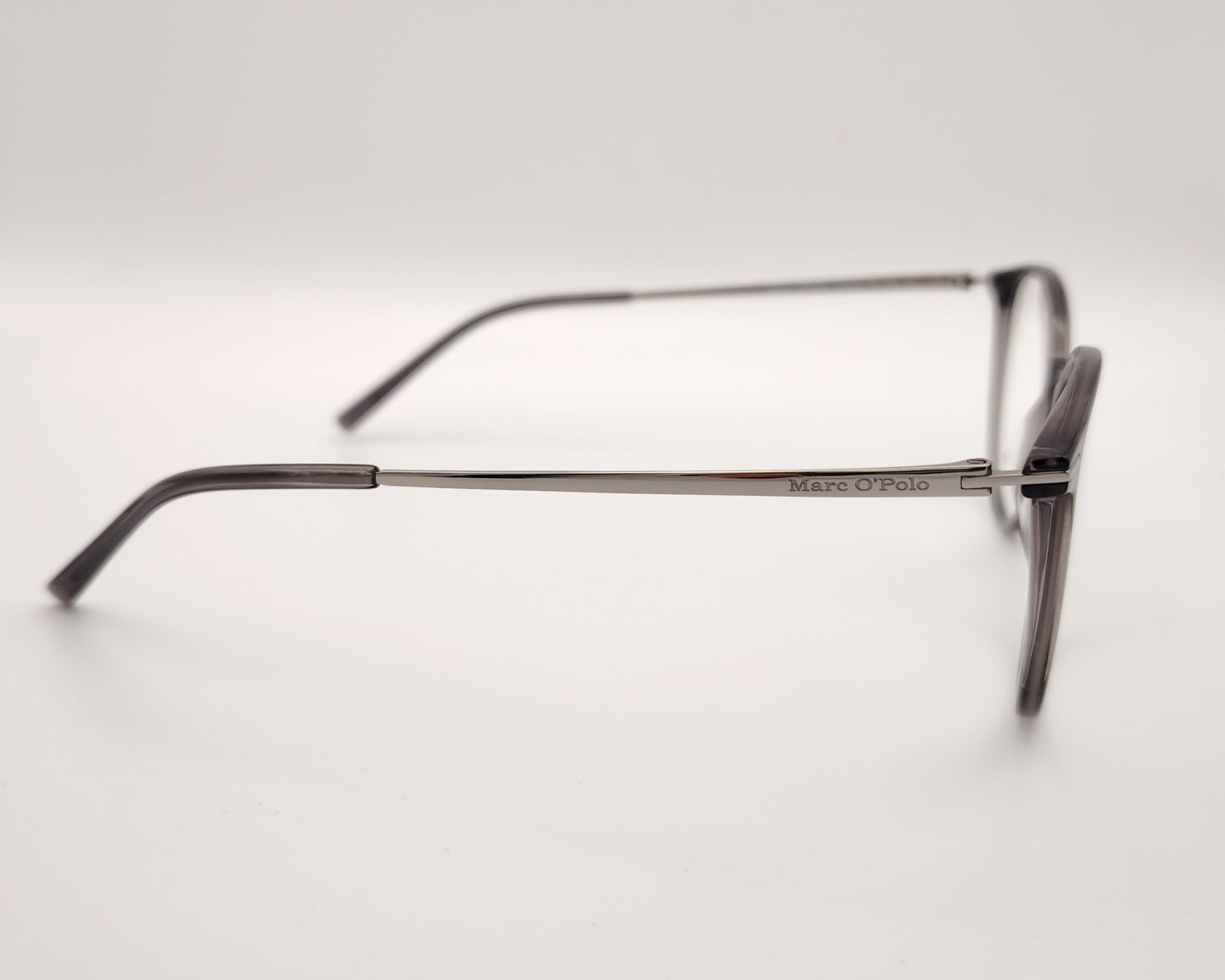 gafas marc o´polo de pasta redonda en color gris traslúcido con varillas de metal