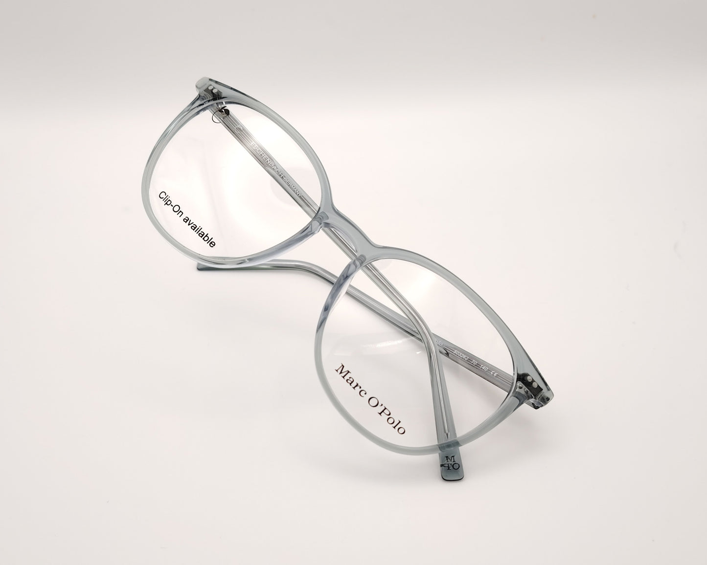 gafas marc o'polo de acetato transparente azulado compatibles con clip de sol