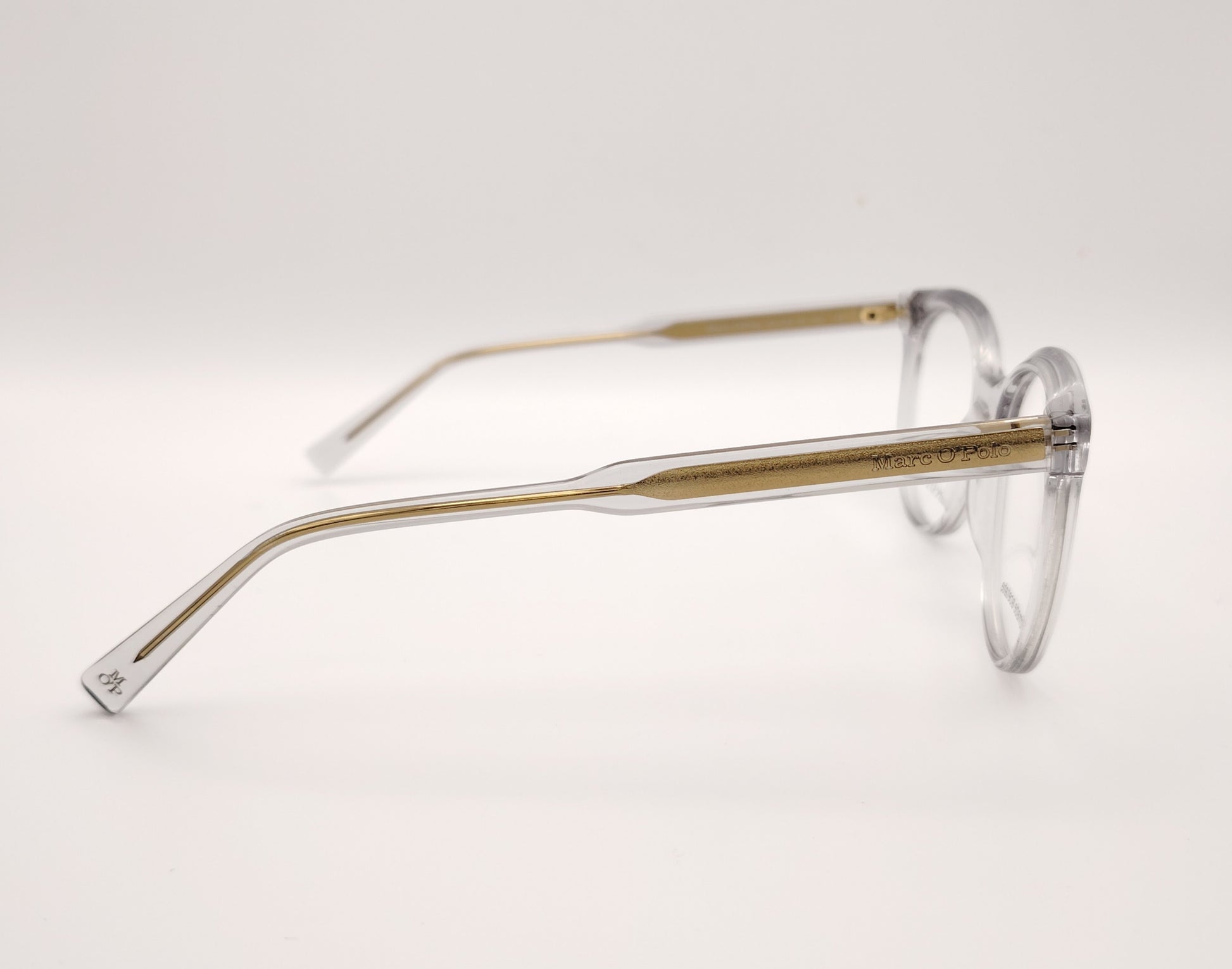 gafas graduadas marc o polo de forma redondeada en acetato transparente con varillas metálicas doradas