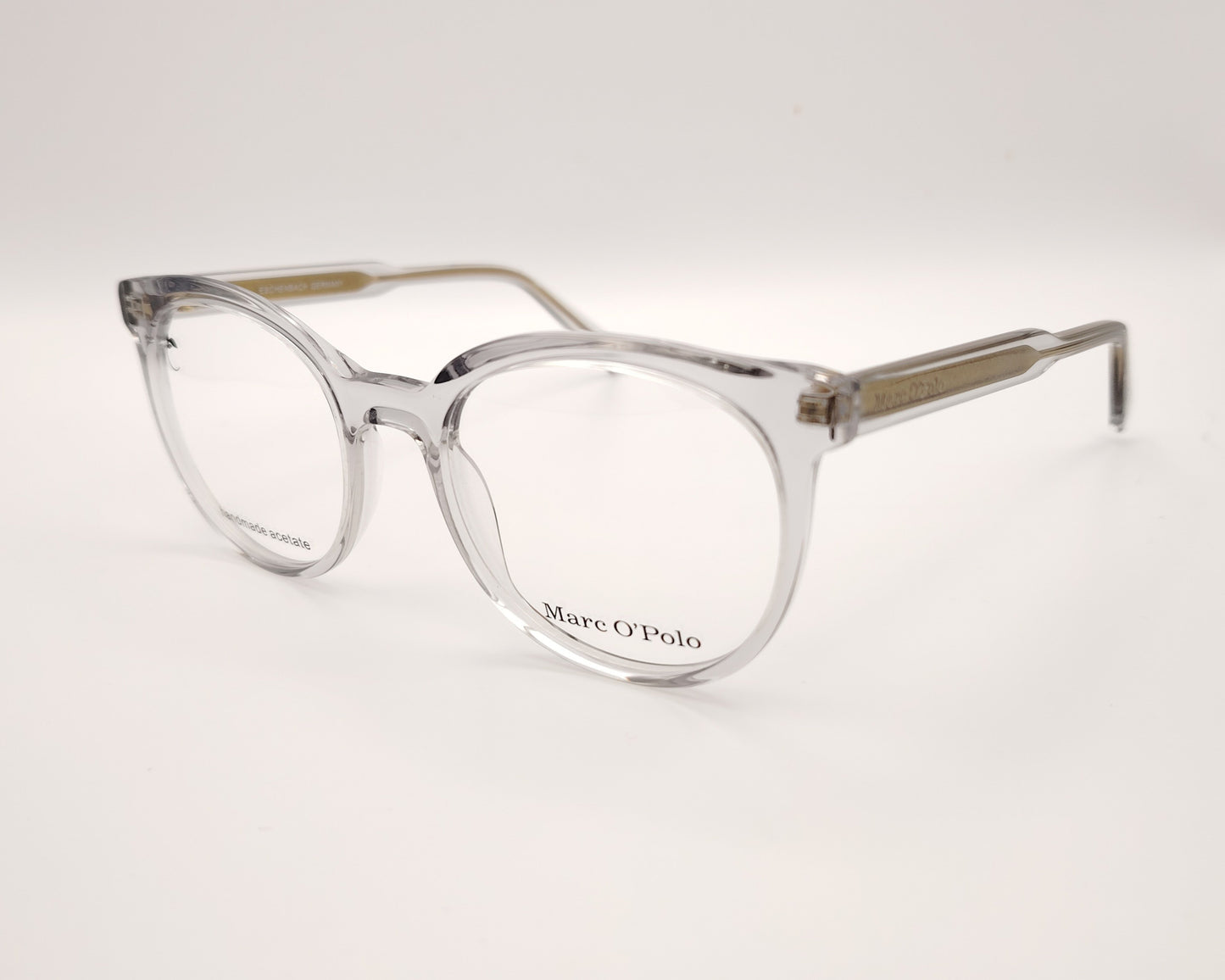 gafas graduadas marc o polo de forma redondeada en acetato transparente con varillas metálicas doradas