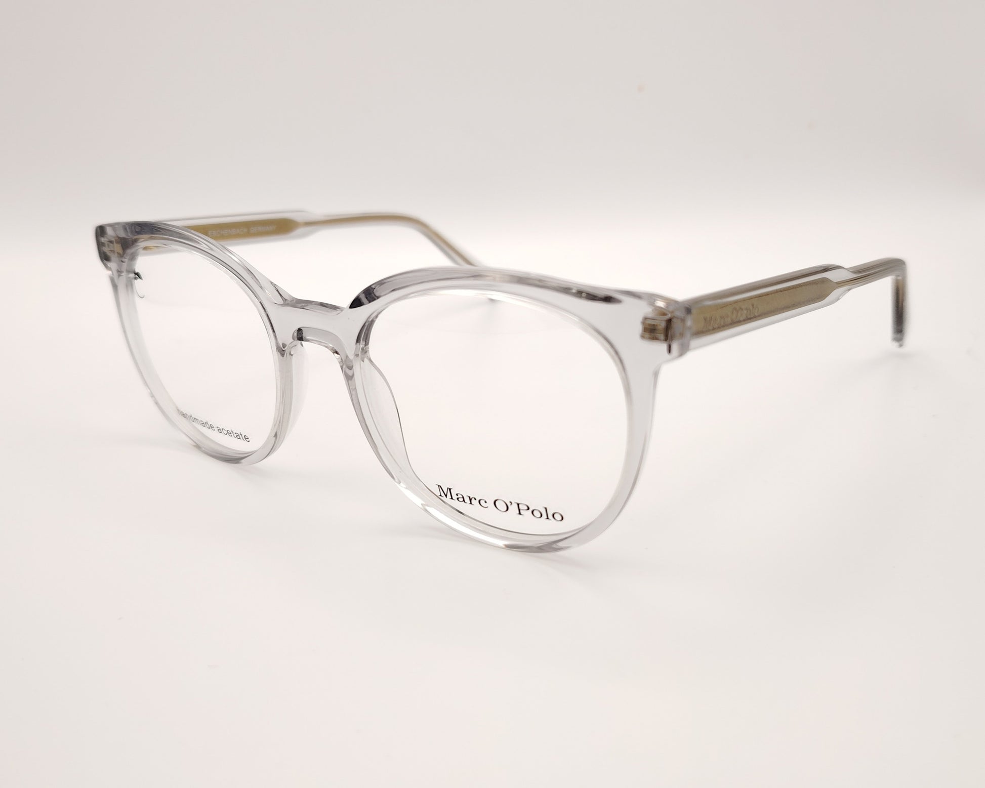 gafas graduadas marc o polo de forma redondeada en acetato transparente con varillas metálicas doradas