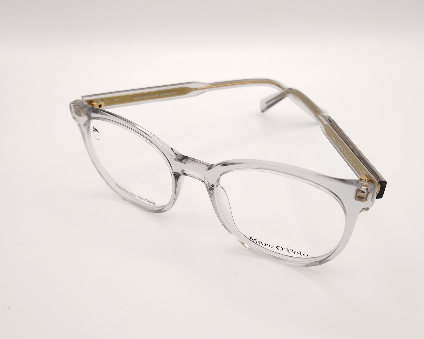 gafas graduadas marc o polo de forma redondeada en acetato transparente con varillas metálicas doradas
