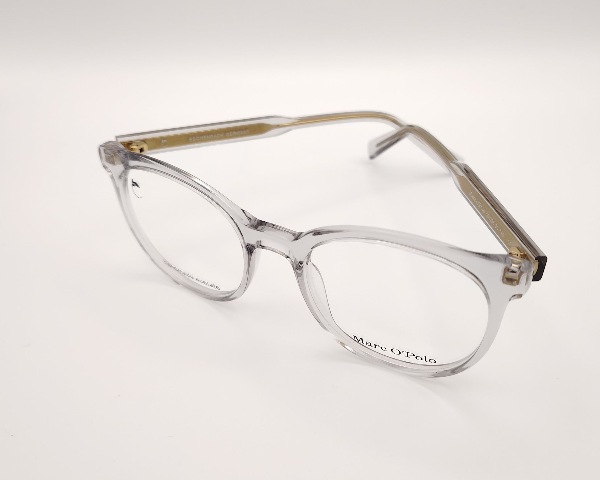 gafas graduadas marc o polo de forma redondeada en acetato transparente con varillas metálicas doradas