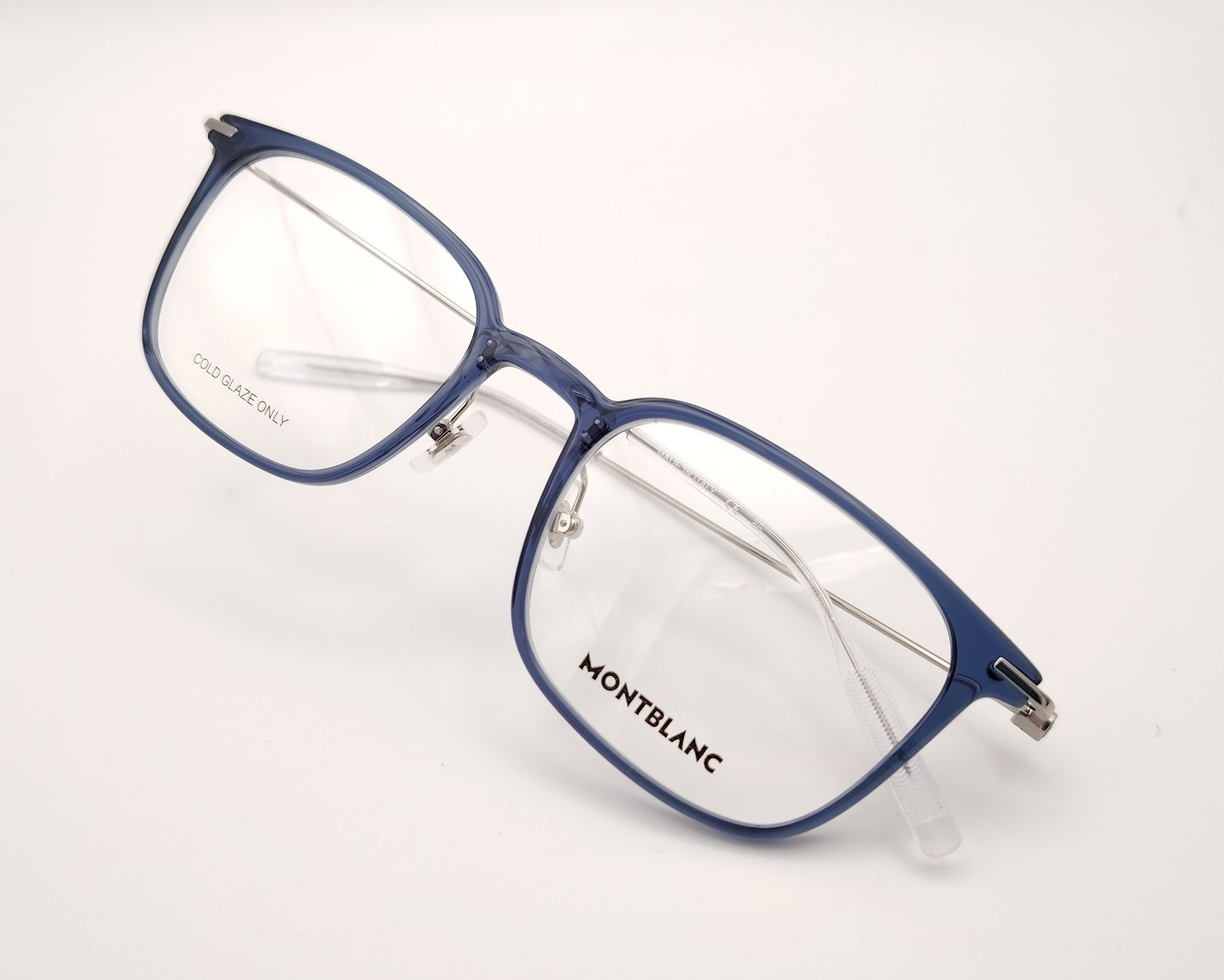 gafas montblanc con montura azul translúcida y varillas metálicas finas