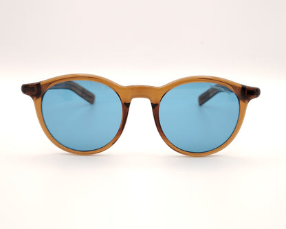 gafas de sol montblanc redondas con montura color ámbar y cristales azules