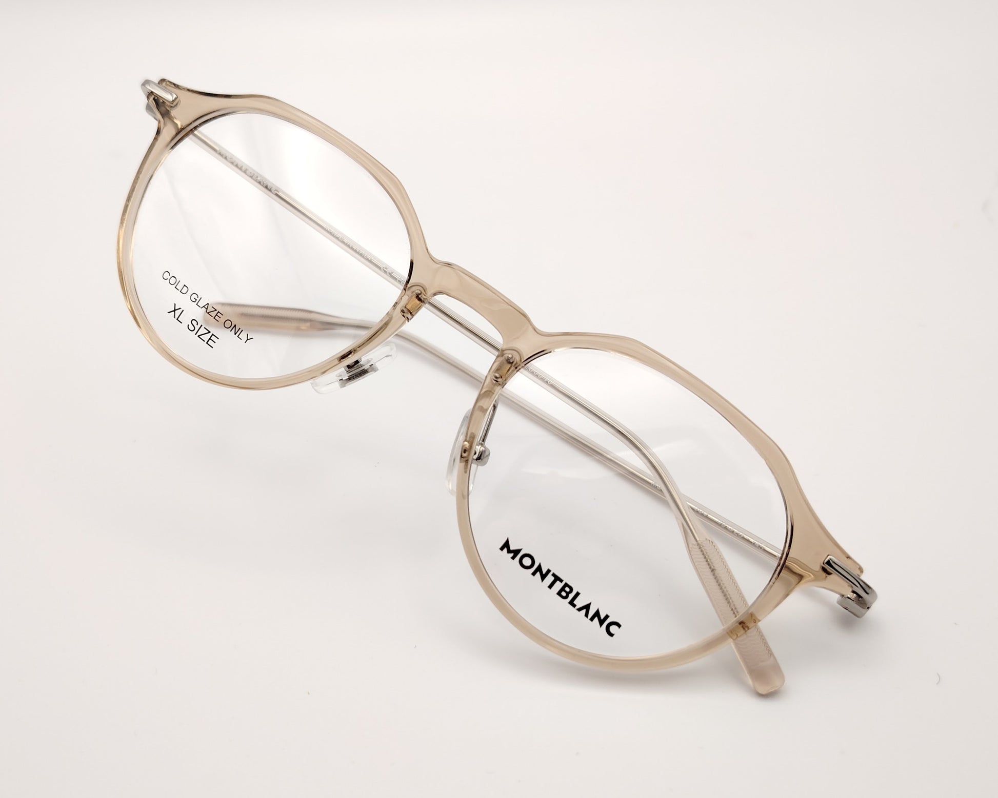 gafas montblanc redondas beige translúcidas con varillas metálicas finas