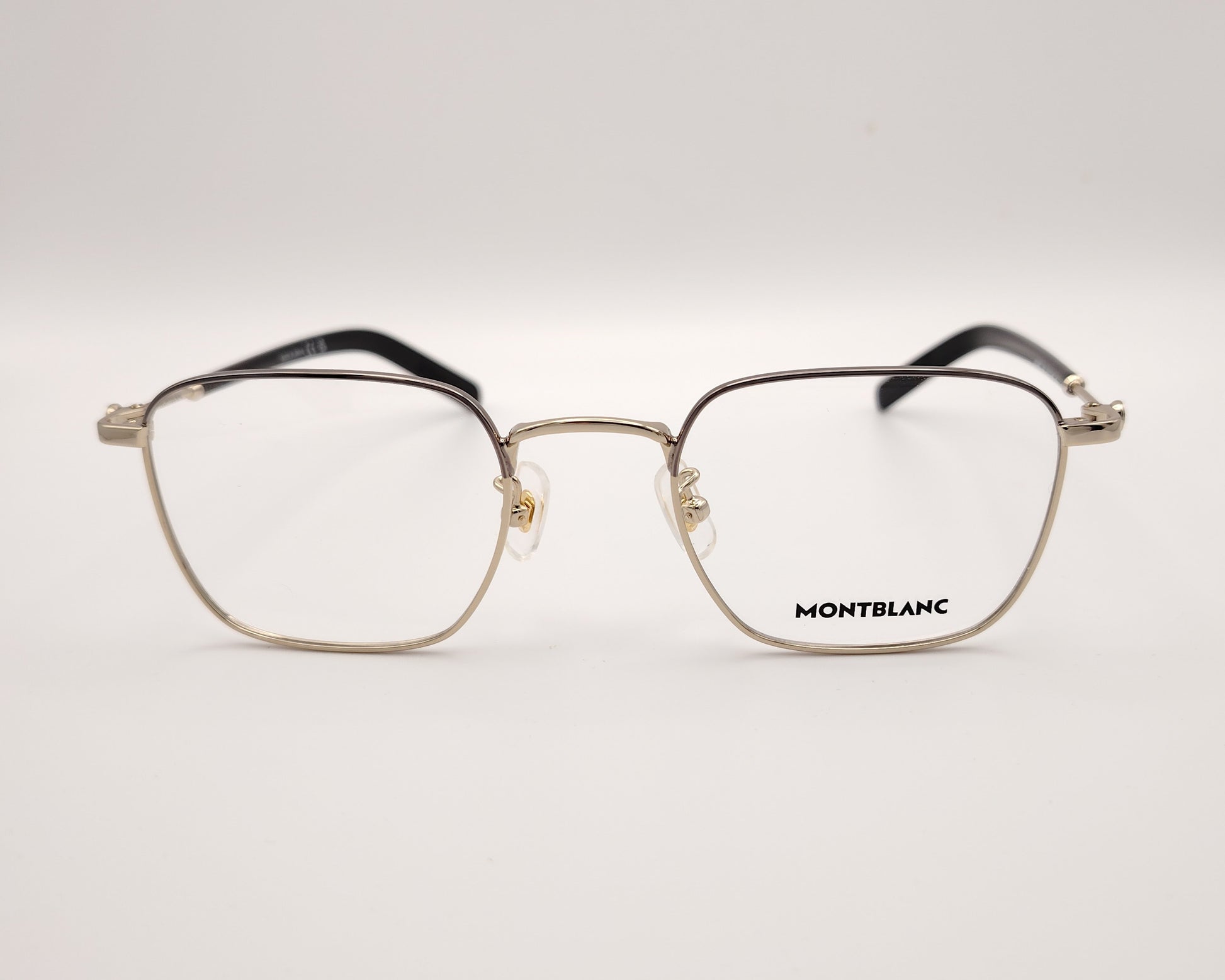 gafas montblanc con montura metálica rectangular y varillas con detalle de logo