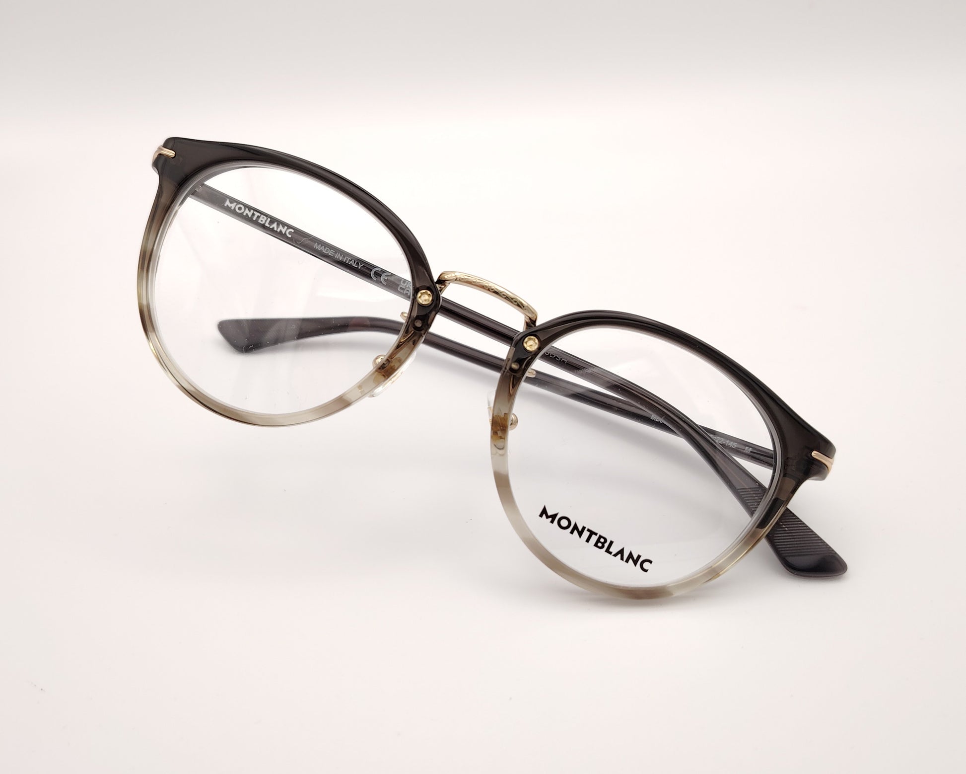 gafas montblanc redondas de acetato con montura degradada en gris oscuro y transparente