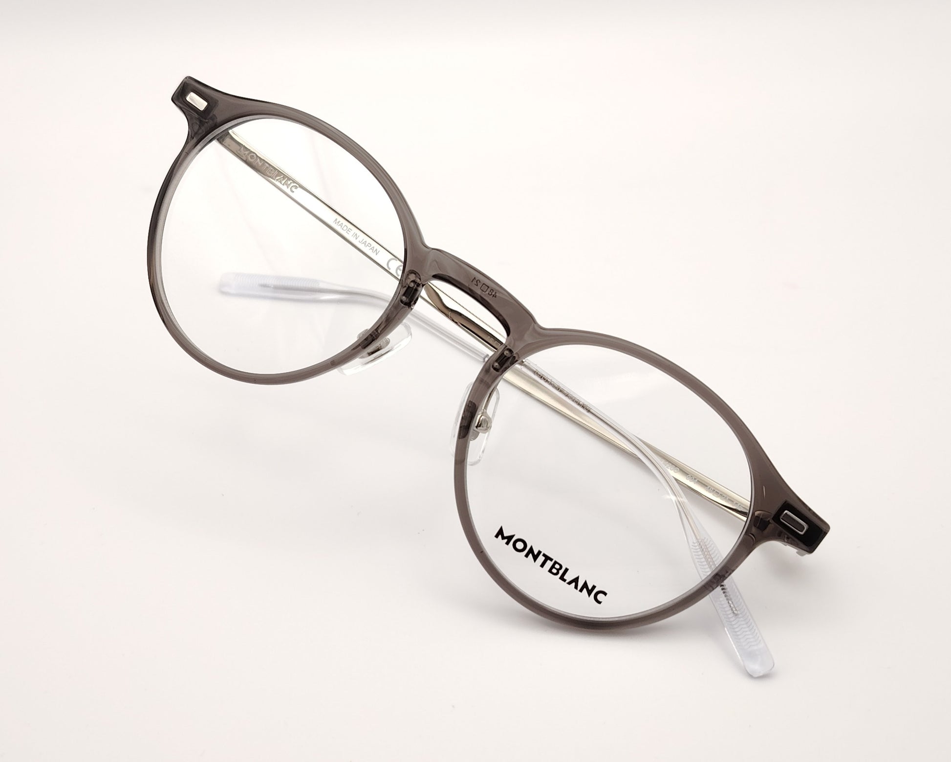 gafas montblanc redondas con frontal gris transparente y varillas metálicas finas
