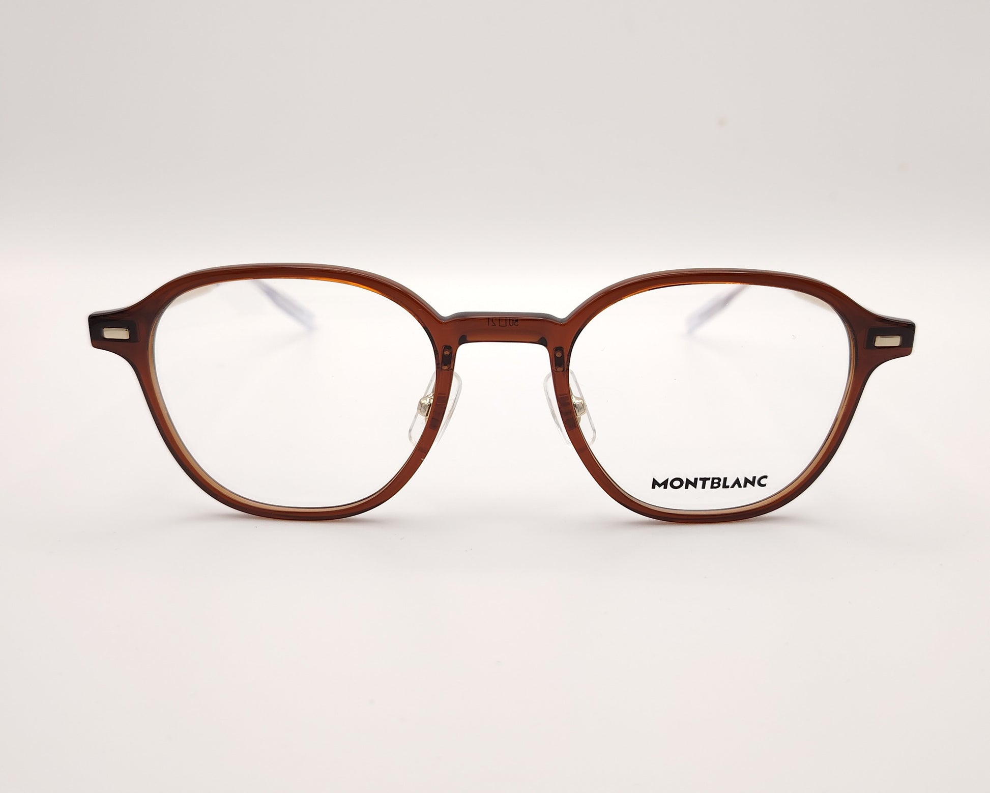 gafas montblanc  semi redondas con frontal marrón translúcido y varillas metálicas finas