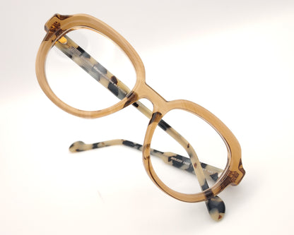 gafas redondas de acetato color caramelo con varillas carey claras y diseño francés