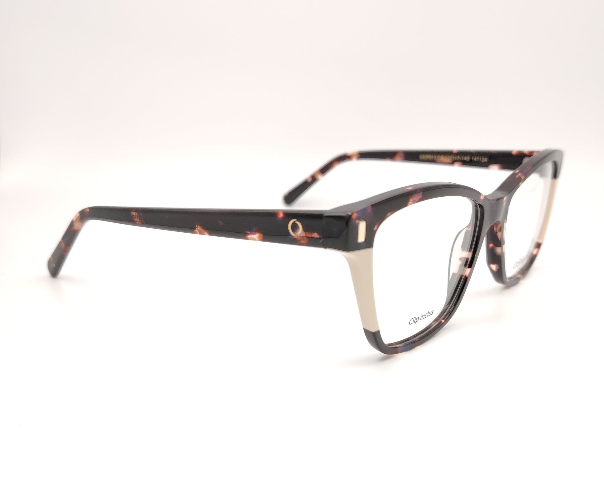gafas de carey con detalles claros y dos clips solares, uno marrón y otro azul degradado