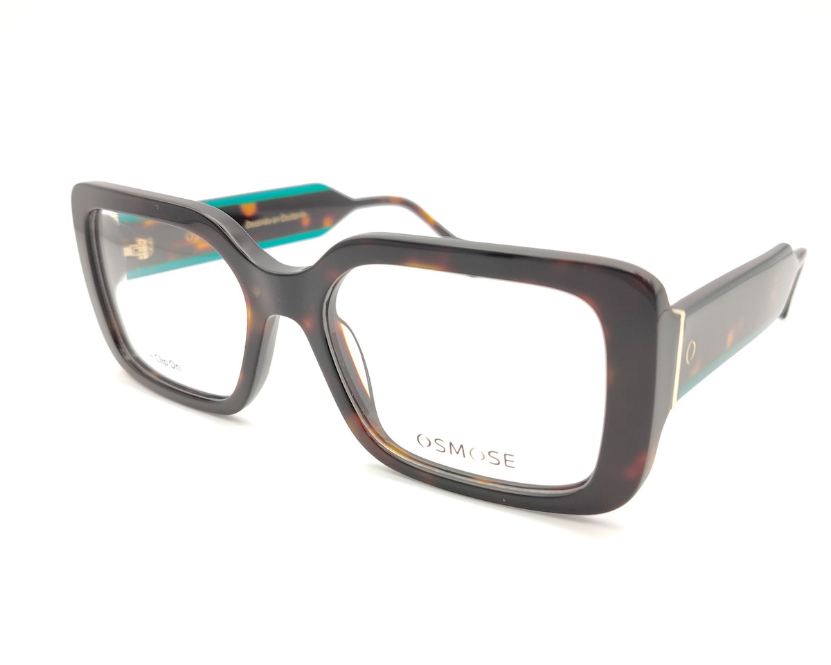 gafas de pasta en color carey con detalles en verde y dos clips solares polarizados