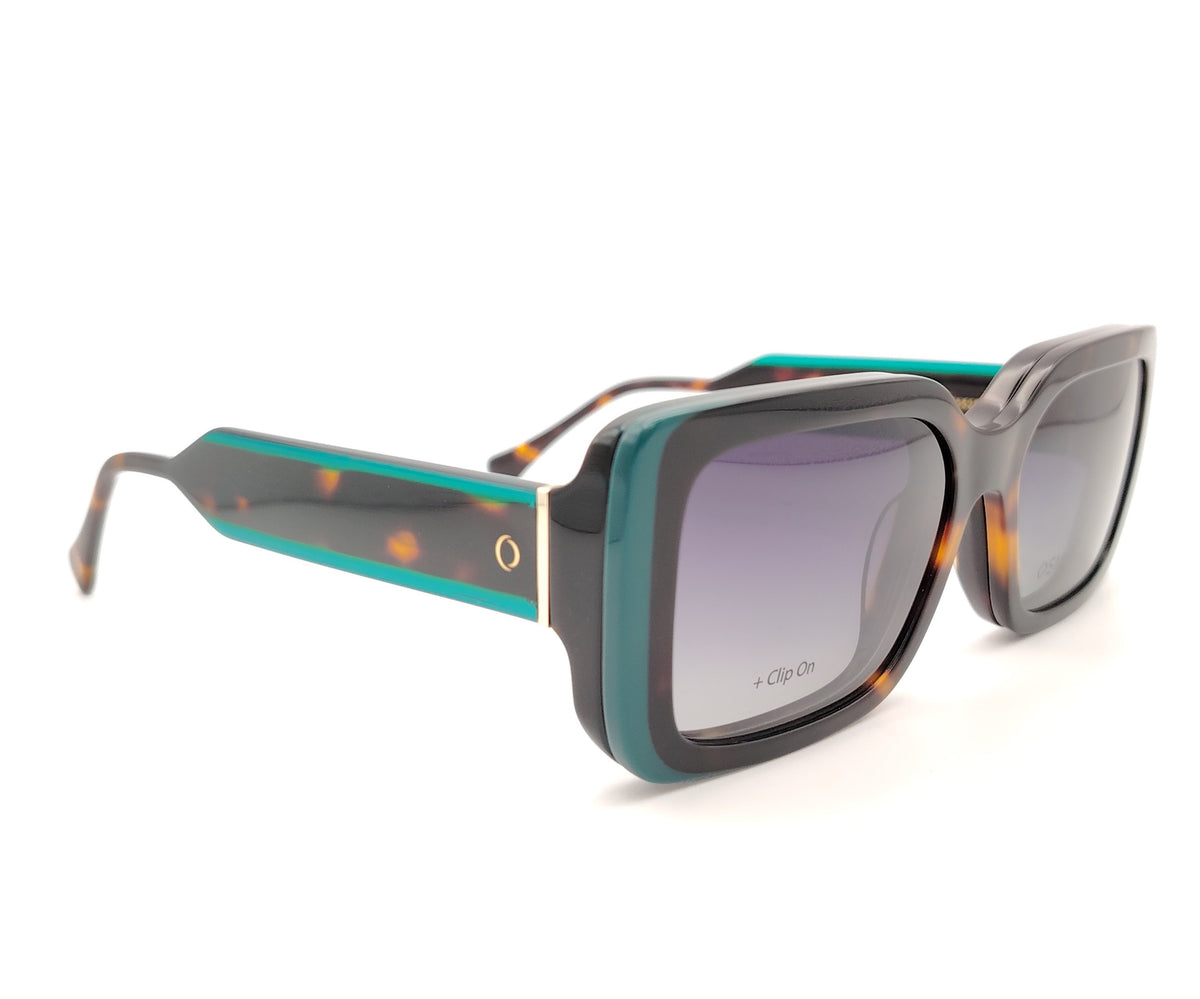 gafas de pasta en color carey con detalles en verde y dos clips solares polarizados