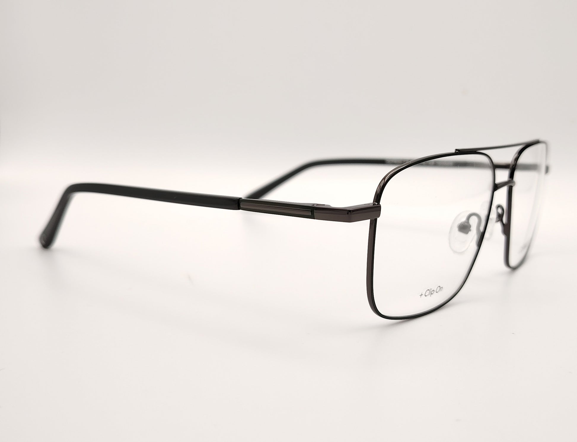 gafas de metal rectangular con doble puente en negro con dos clips, uno polarizado y otro amarillo