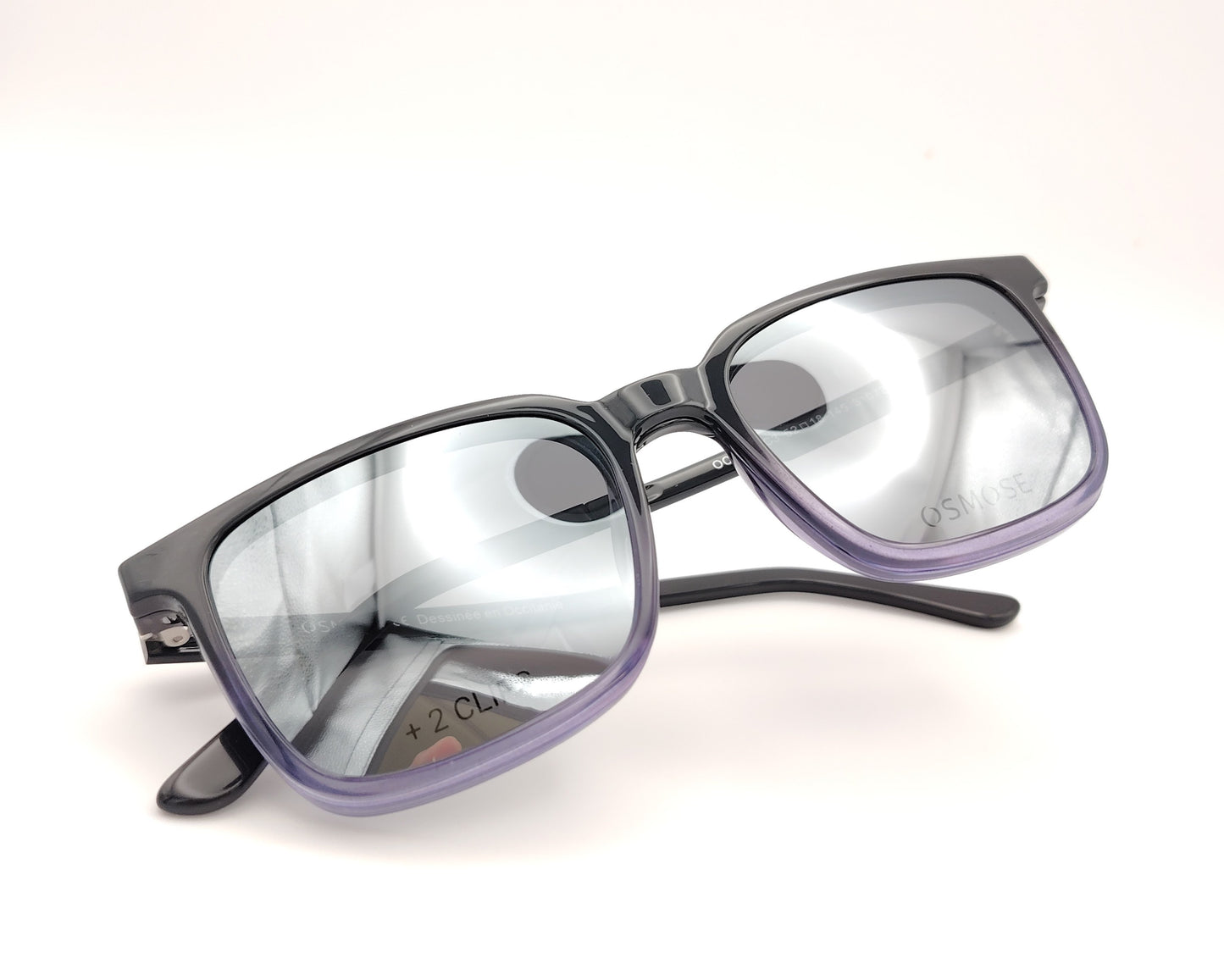 gafas de pasta en pasta negro degradado a lila  con dos clips, uno de sol polarizado espejo plata y otro amarillo