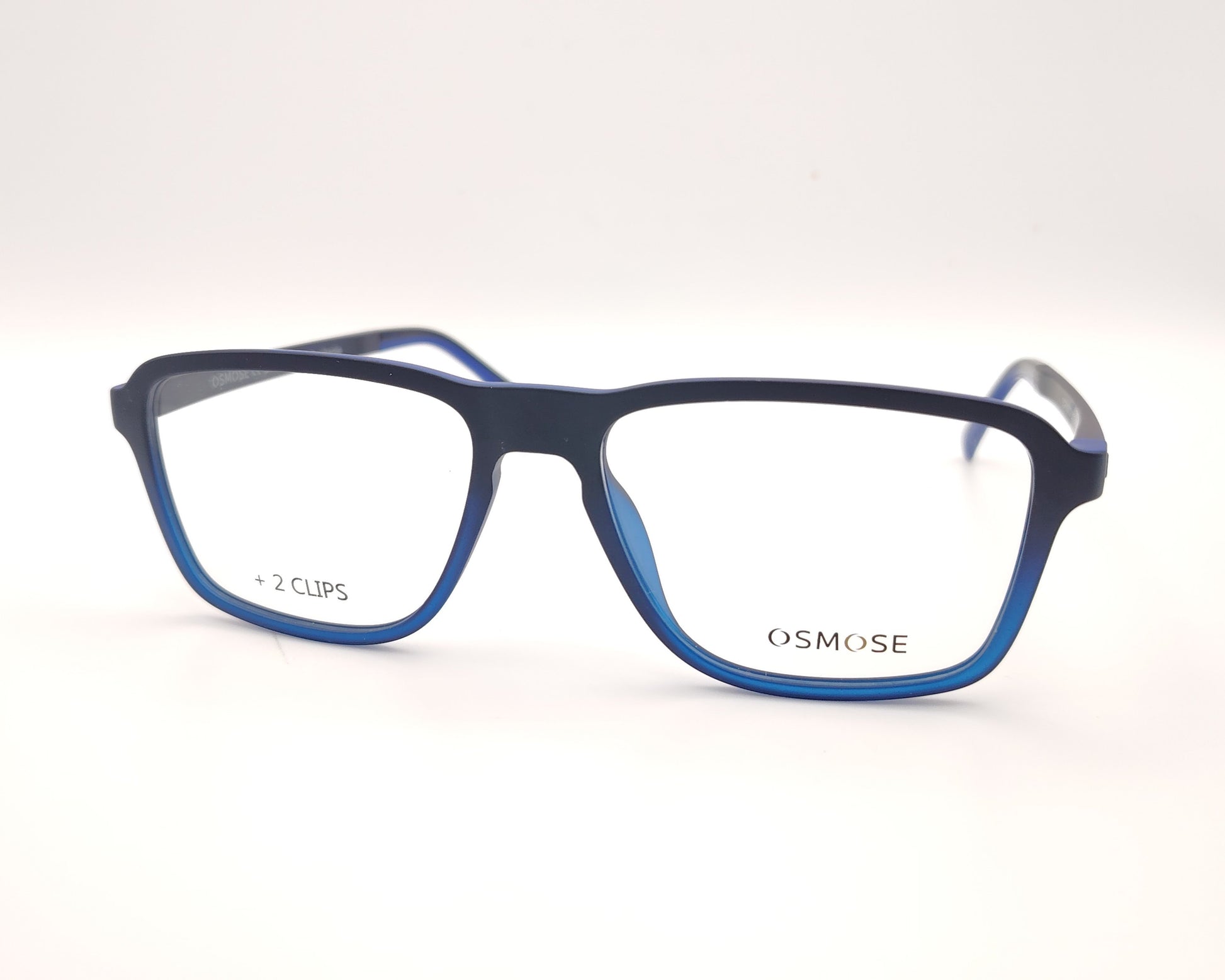 gafas de pasta en pasta azul mate degradado con dos clips, uno de sol polarizado y otro amarillo