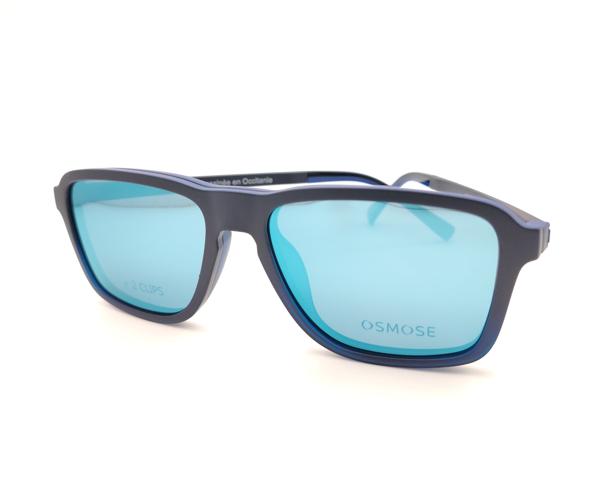 gafas de pasta en pasta azul mate degradado con dos clips, uno de sol polarizado y otro amarillo