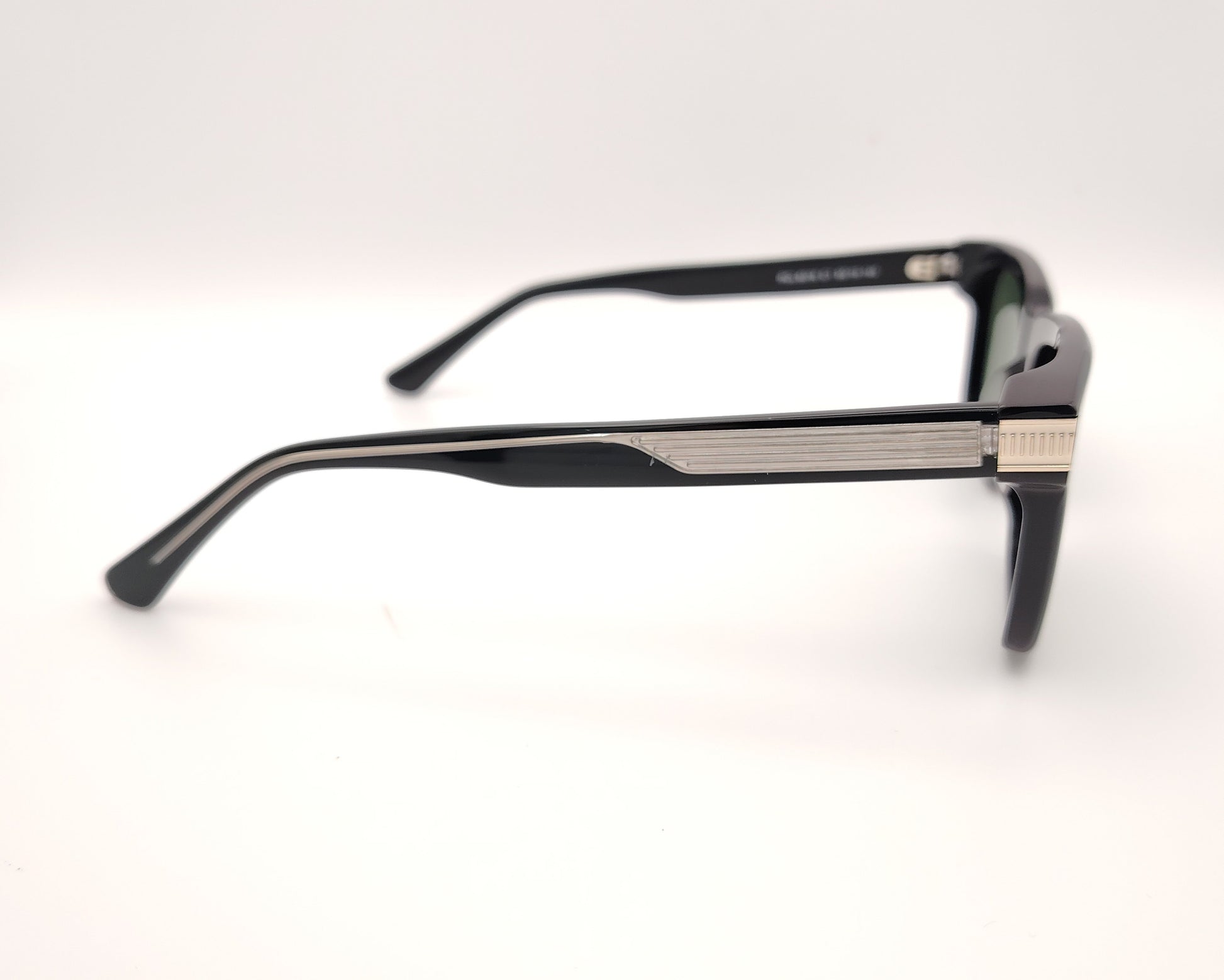 gafas de sol negras acetato forma rectangular lentes verdes polarizadas