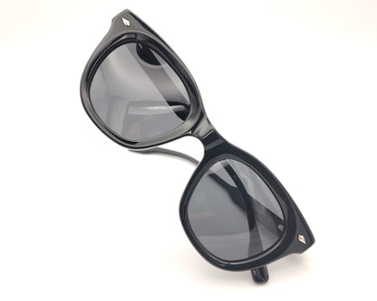 gafas de sol de acetato negro con lentes polarizadas a juego