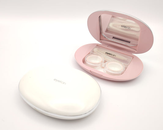 estuches para lentillas con espejo y pinza en colores blanco y rosa

