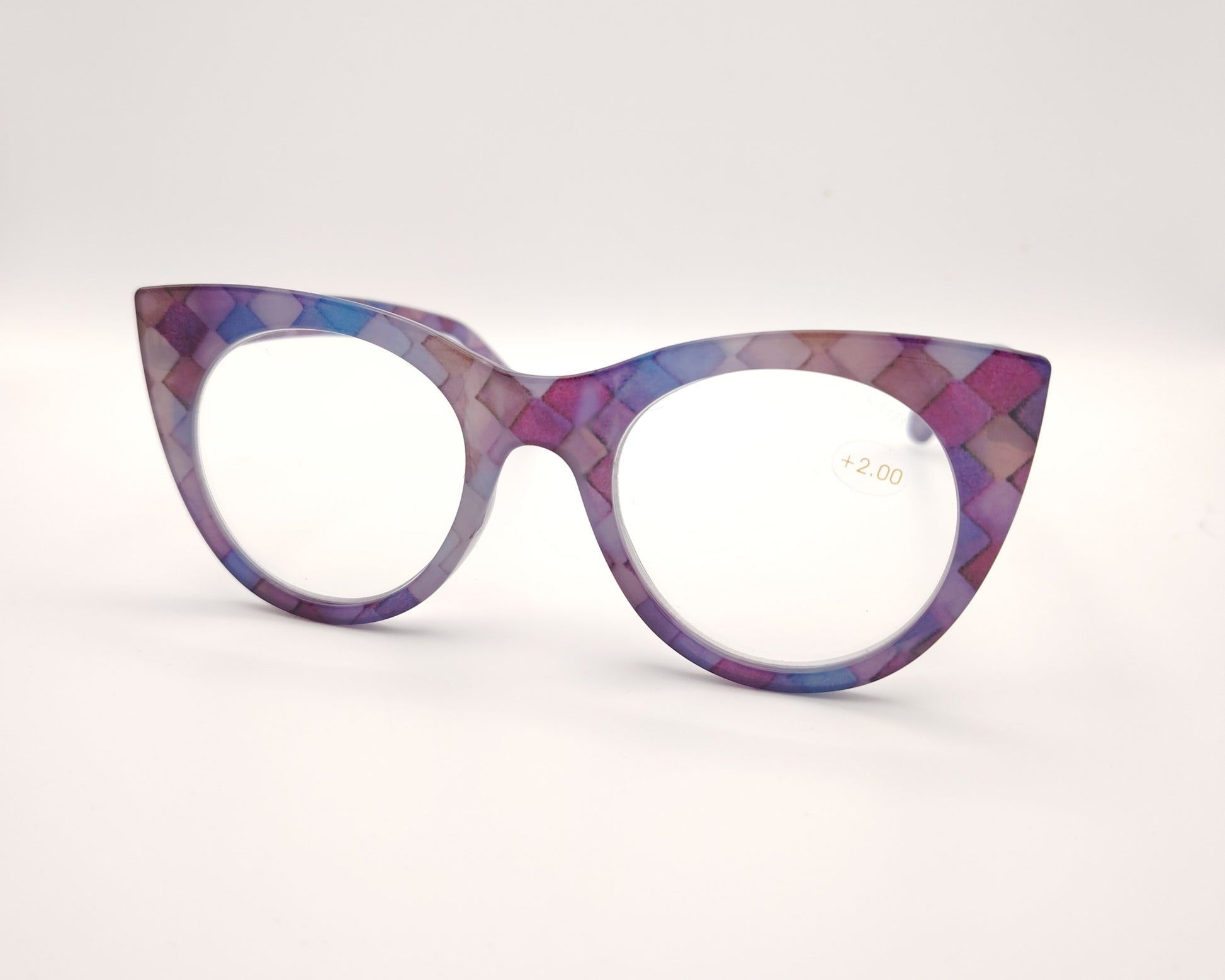 gafas premontadas de lectura de forma redondeada en tonos lila y rosa con estampado geométrico