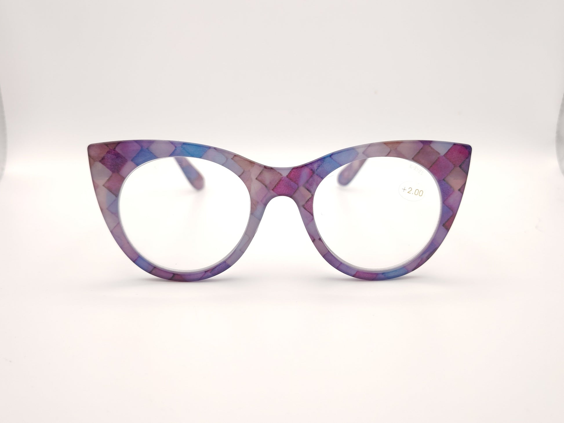 gafas premontadas de lectura de forma redondeada en tonos lila y rosa con estampado geométrico