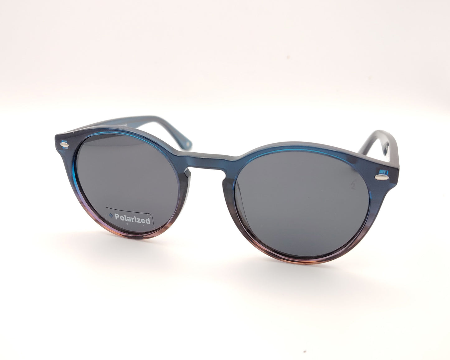 gafas de sol redondas de acetato con lentes oscuras y montura retro