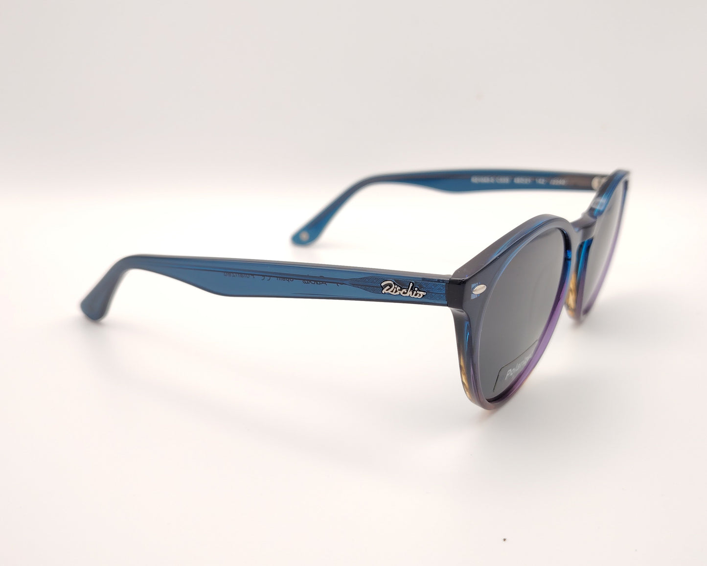 gafas de sol redondas de acetato con lentes oscuras y montura retro