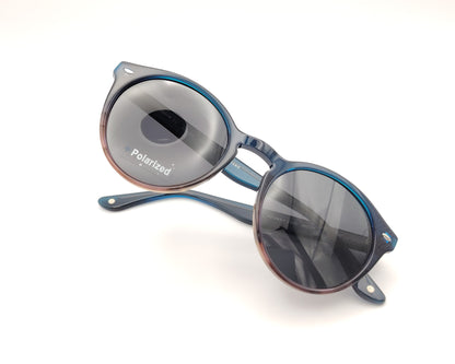 gafas de sol redondas de acetato con lentes oscuras y montura retro