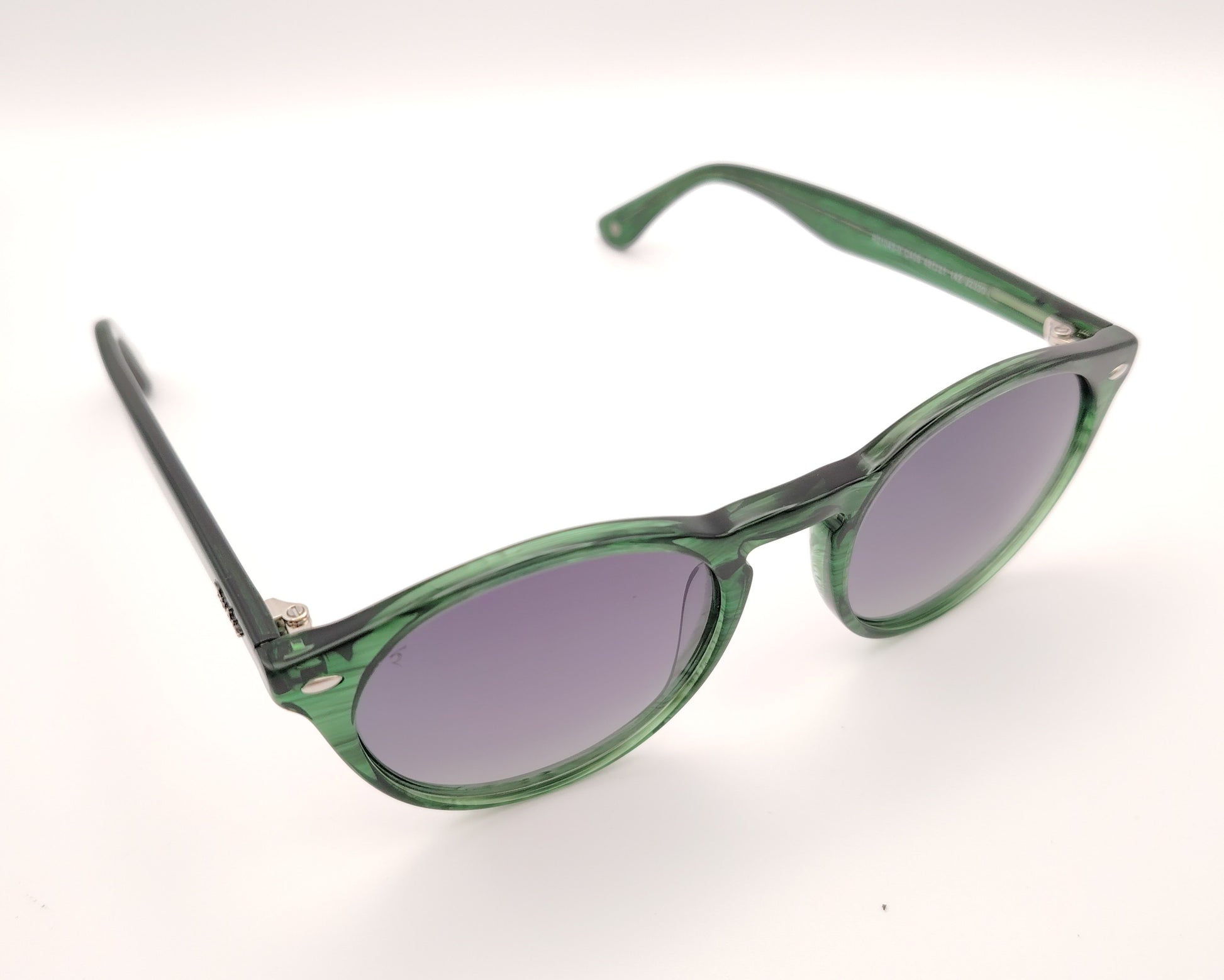 gafas de sol redondas de acetato con lentes oscuras y montura retro