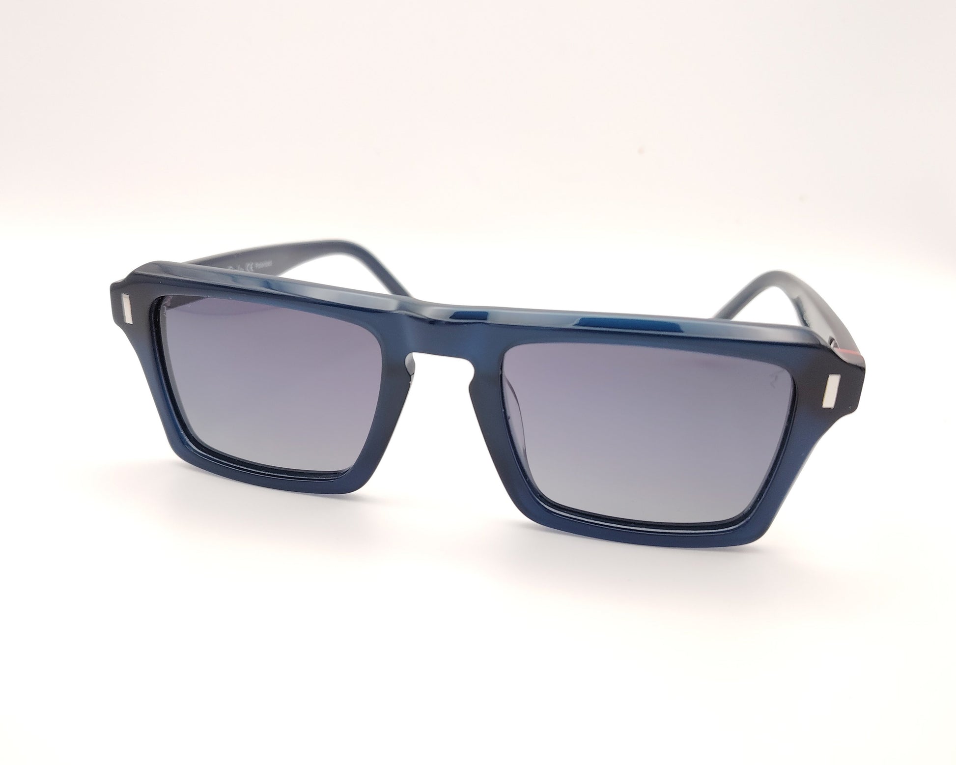 gafas de sol rectangulares de acetato con lentes oscuras polarizadas y montura robusta en color azul