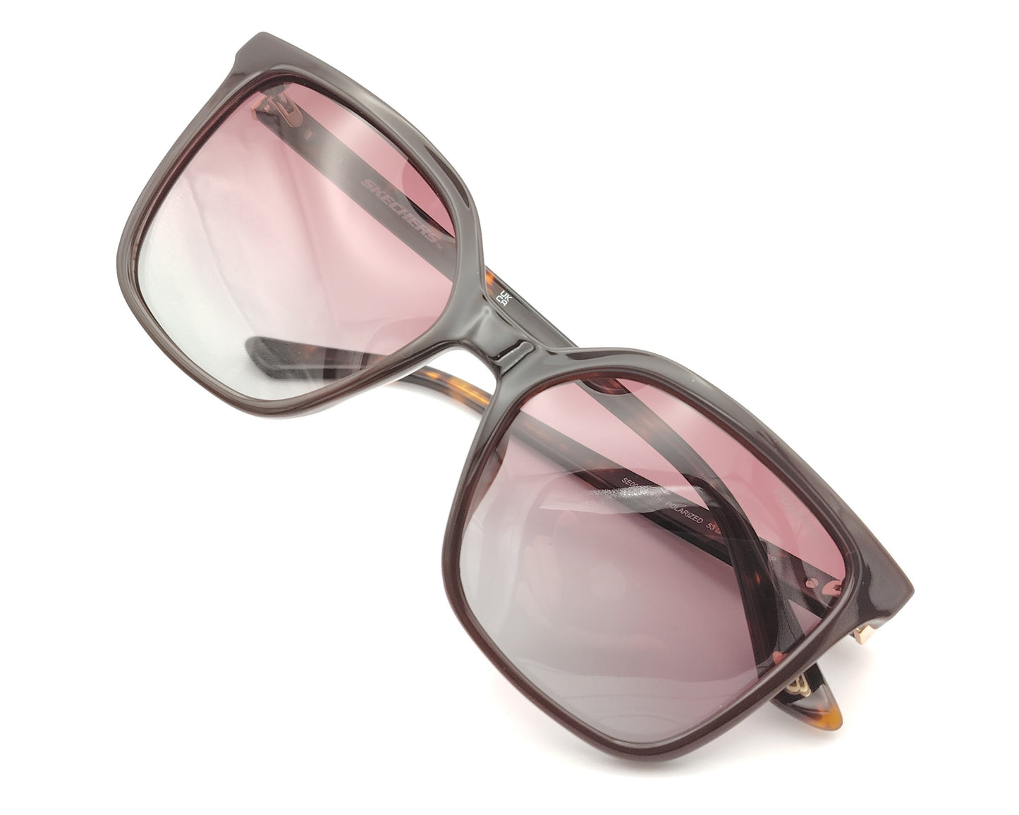 gafas de sol skechers con montura carey y lentes burdeos degradadas