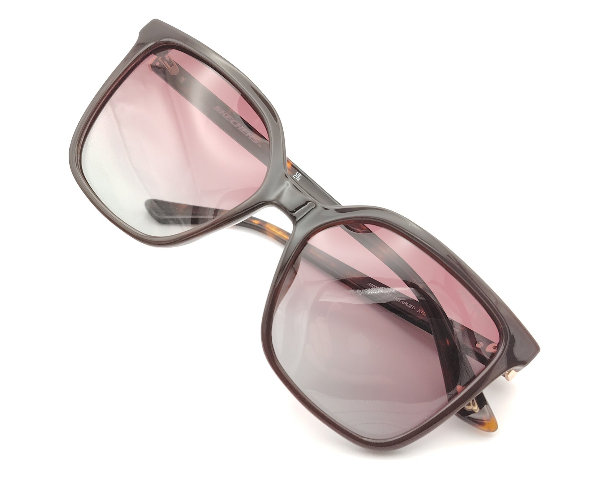 gafas de sol skechers con montura carey y lentes burdeos degradadas