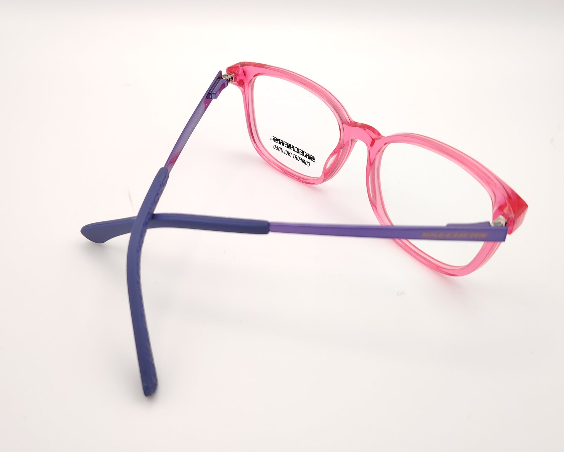 gafas graduadas skechers infantiles rosa translúcidas con varillas de metal violeta
