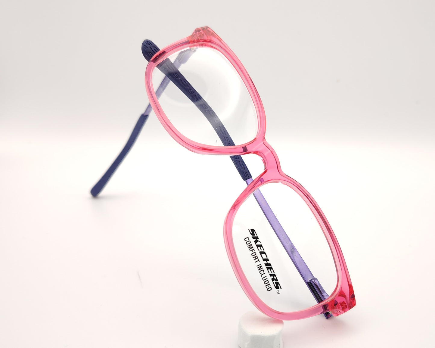 gafas graduadas skechers infantiles rosa translúcidas con varillas de metal violeta