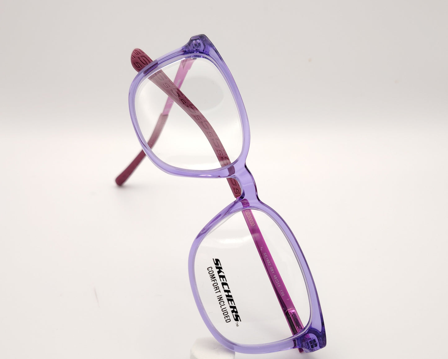 gafas graduadas skechers infantiles lilas translúcidas con varillas de metal rosa