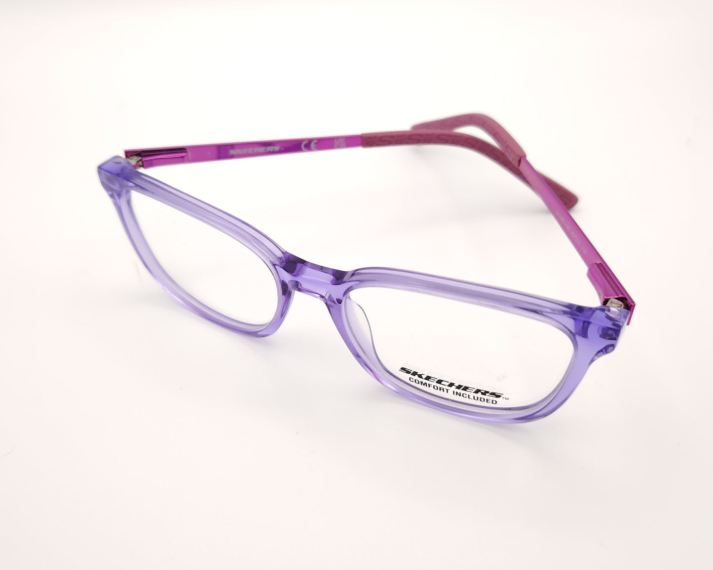gafas graduadas skechers infantiles lilas translúcidas con varillas de metal rosa