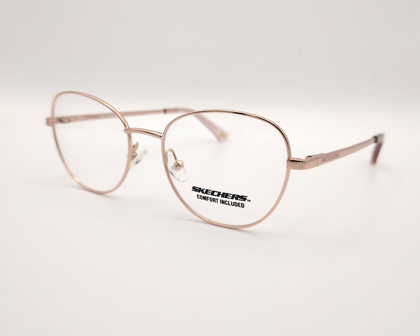 gafas graduadas infantiles skechers metalizadas rosa claro con forma redondeada