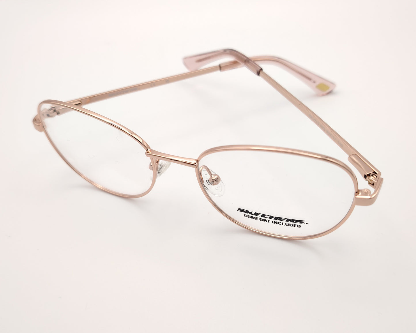 gafas graduadas infantiles skechers metalizadas rosa claro con forma redondeada