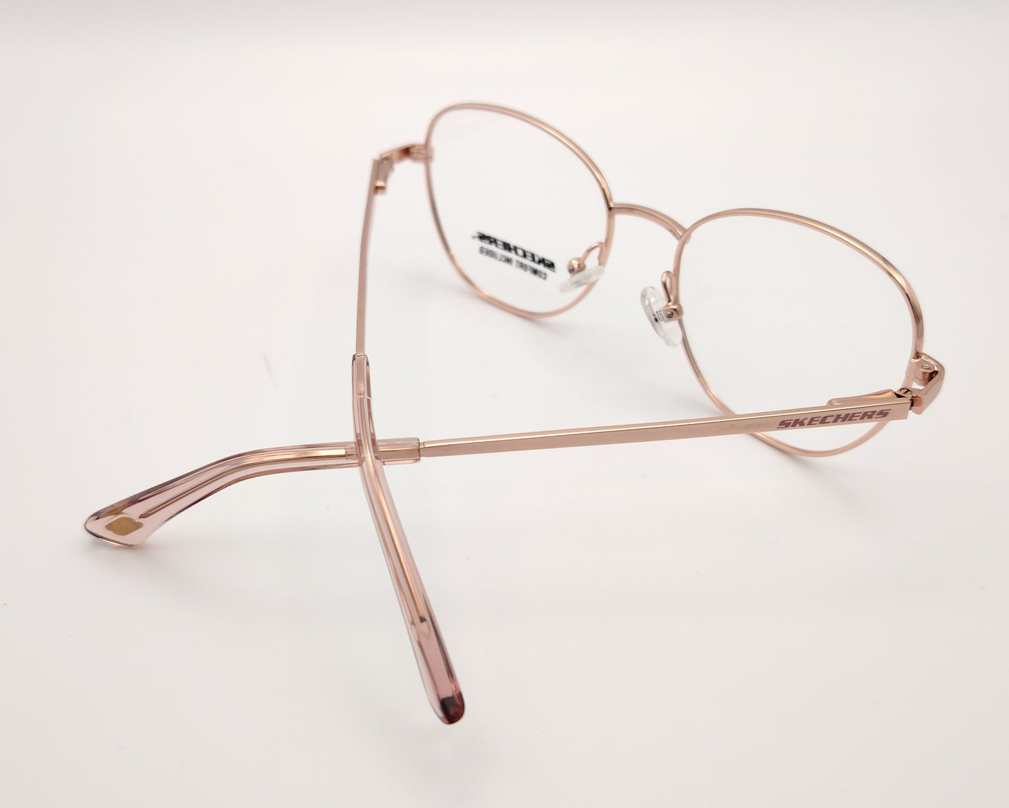 gafas graduadas infantiles skechers metalizadas rosa claro con forma redondeada
