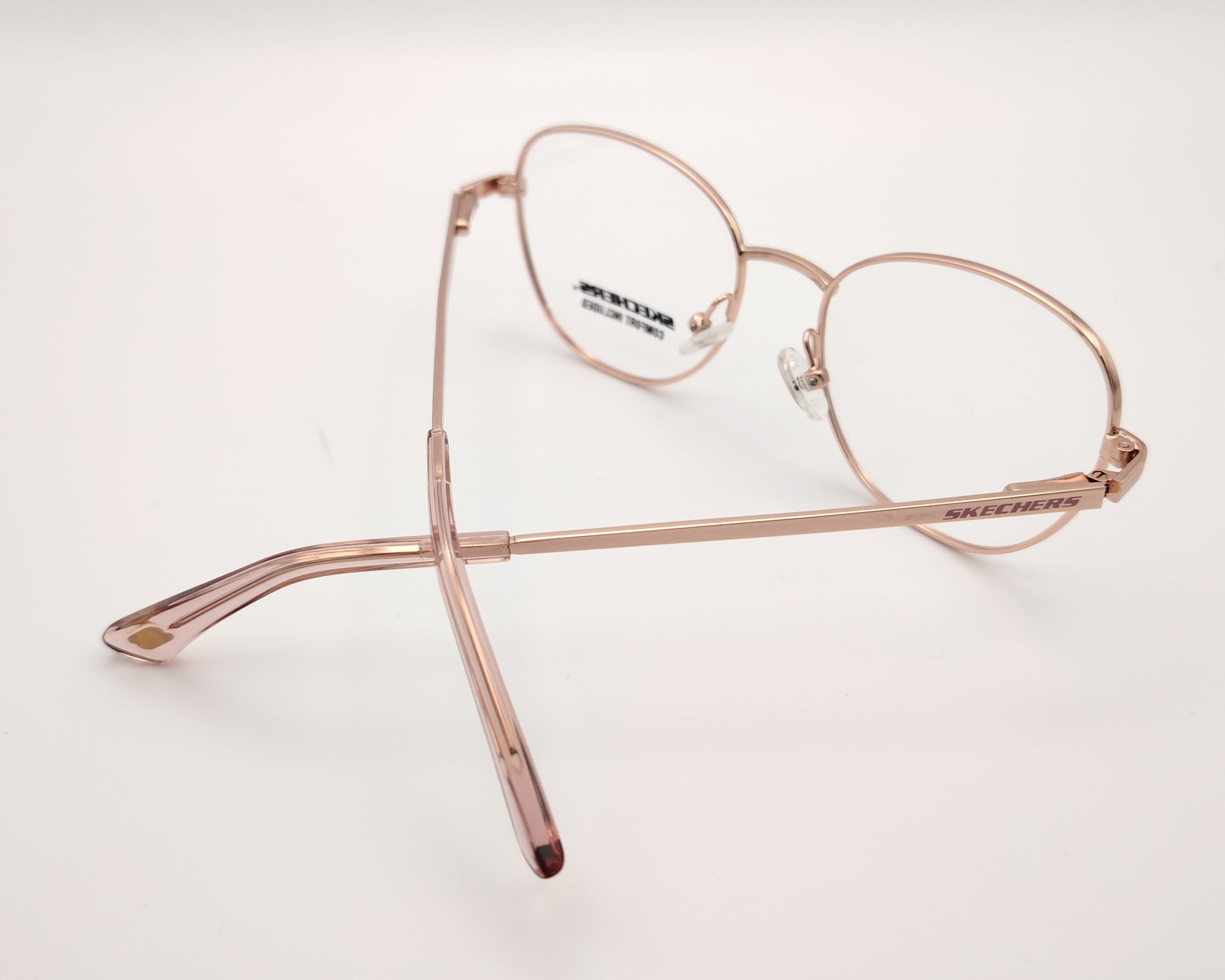 gafas graduadas infantiles skechers metalizadas rosa claro con forma redondeada