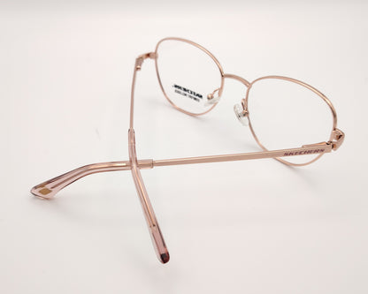 gafas graduadas infantiles skechers metalizadas rosa claro con forma redondeada