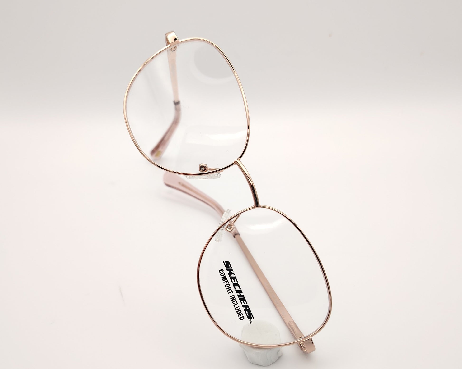 gafas graduadas infantiles skechers metalizadas rosa claro con forma redondeada