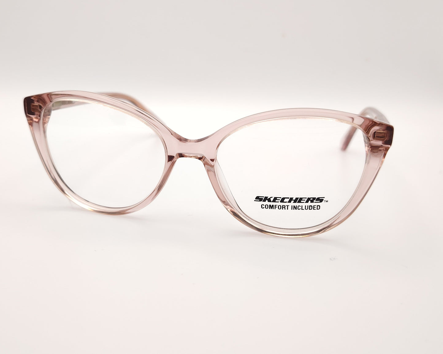 gafas graduadas skechers infantiles rosas translúcidas forma de mariposa redondeada