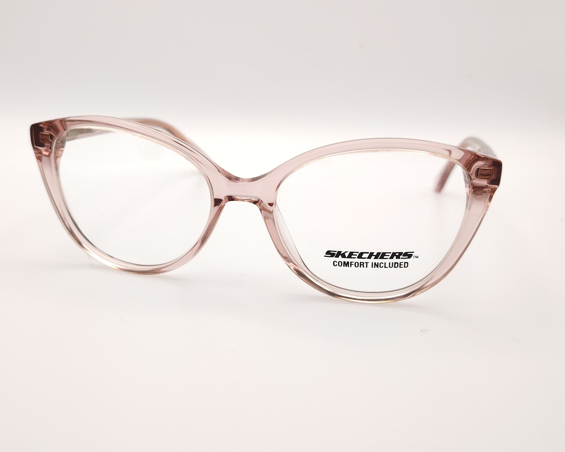 gafas graduadas skechers infantiles rosas translúcidas forma de mariposa redondeada