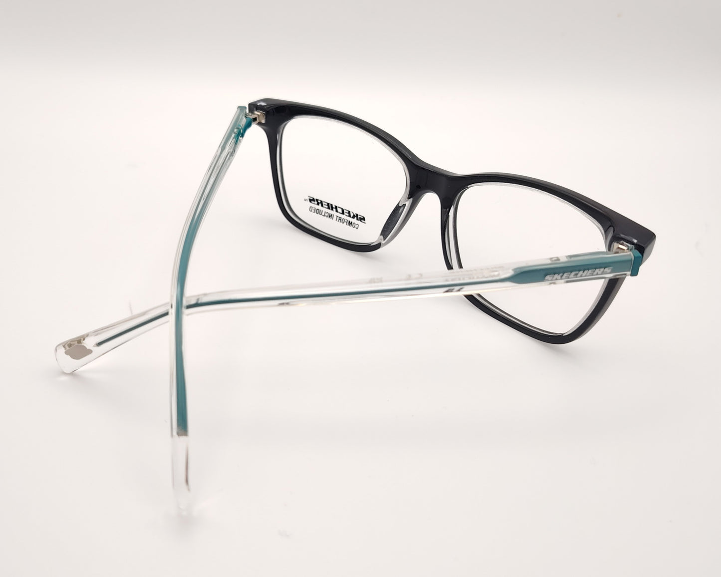 gafas graduadas skechers infantiles negras con varillas transparentes y detalles azules